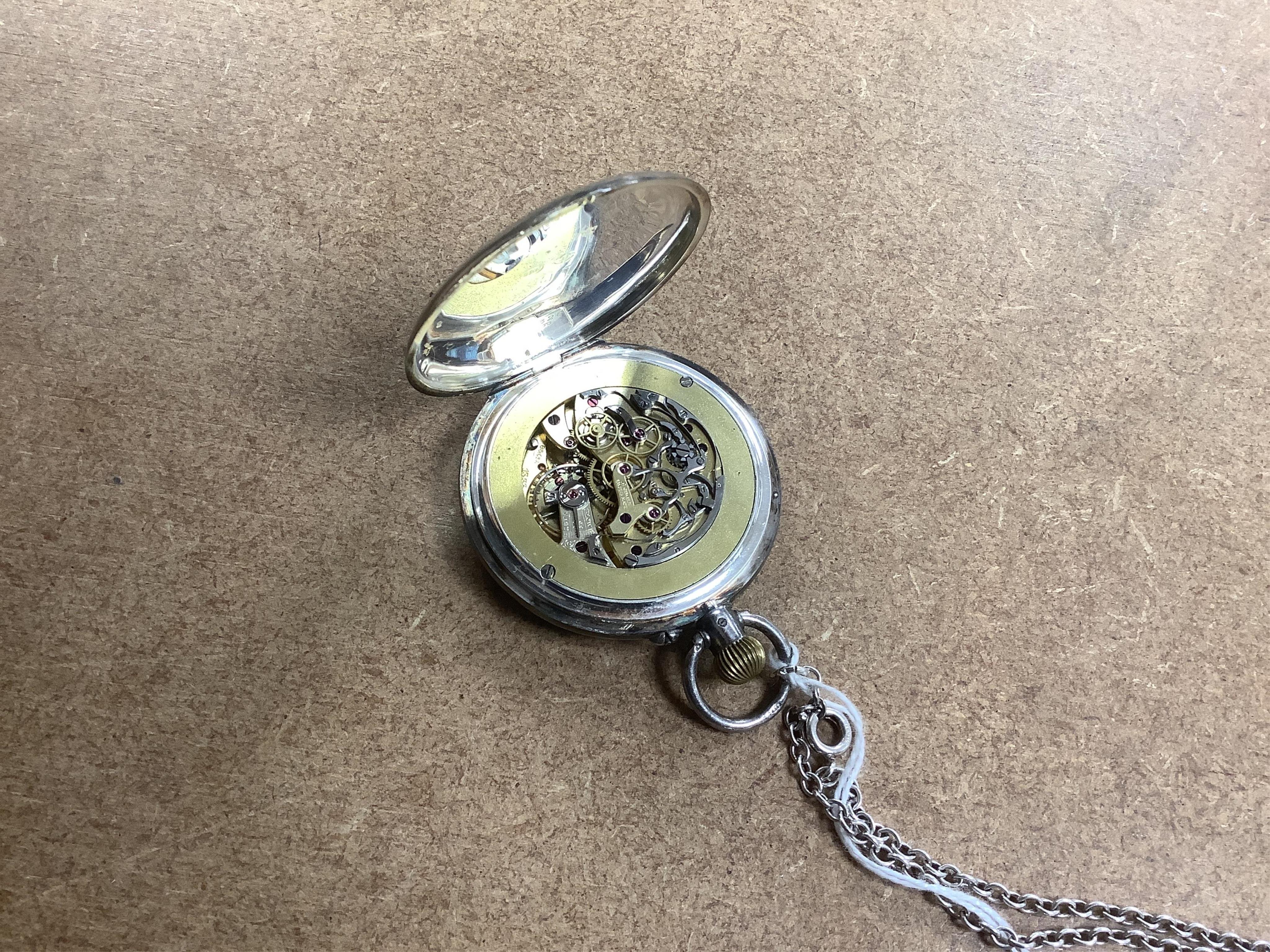 A George V silver open farce keyless pocket watch, by S. Smith & Son, with two subsidiary dials, case diameter 45mm, with a sterling chain. Condition - poor